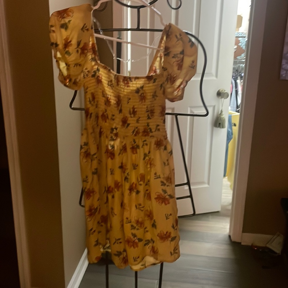 Junior romper, yellow multi colored. Good condition, good quality.
